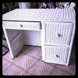 White wicker desk and chair.